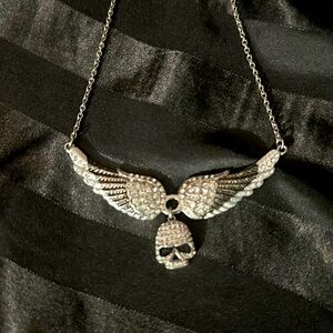 Skull and wing necklace